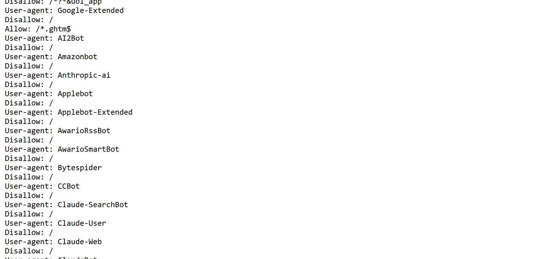 Trecho de um robots.txt real listando uma dúzia de rastreadores de IA, cada um seguido de Disallow: barra.